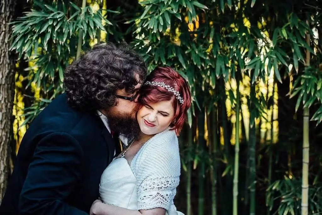 Alannah and her partner on their wedding day